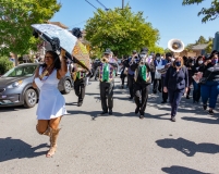 Dancer Dada and New Orleans style marching band lead the demonstration